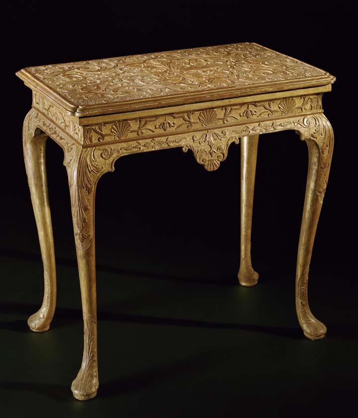A gilt gesso side table